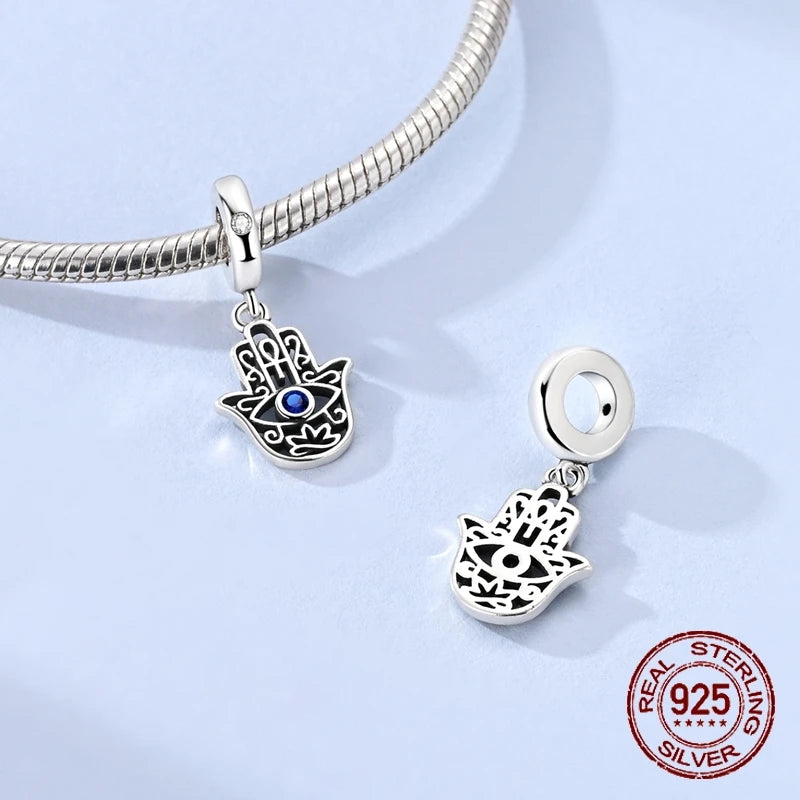 Sterling Silver Intricate Hand Shaped