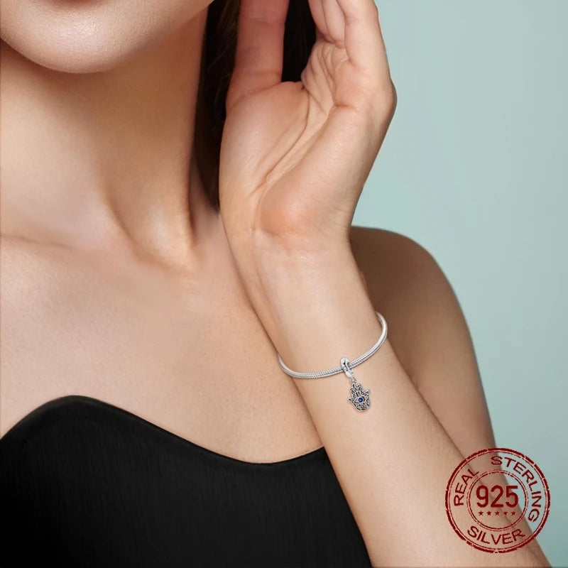 Sterling Silver Intricate Hand Shaped